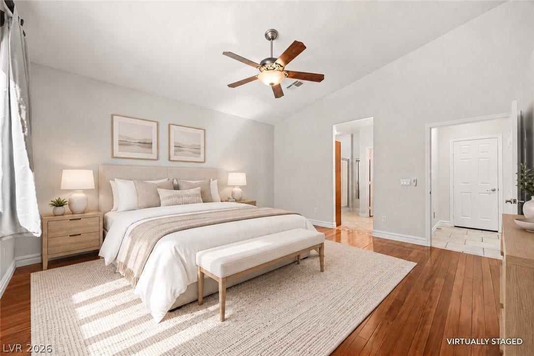 753 Wigan Pier Drive, Henderson, NV 89002 Rich hardwood flooring complements the vaulted ceiling in this spacious bedroom suite.