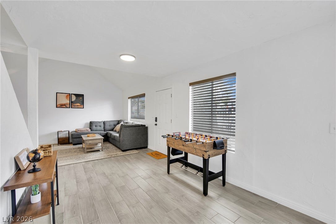 Clean lines and durable tile flooring define this versatile recreation space.