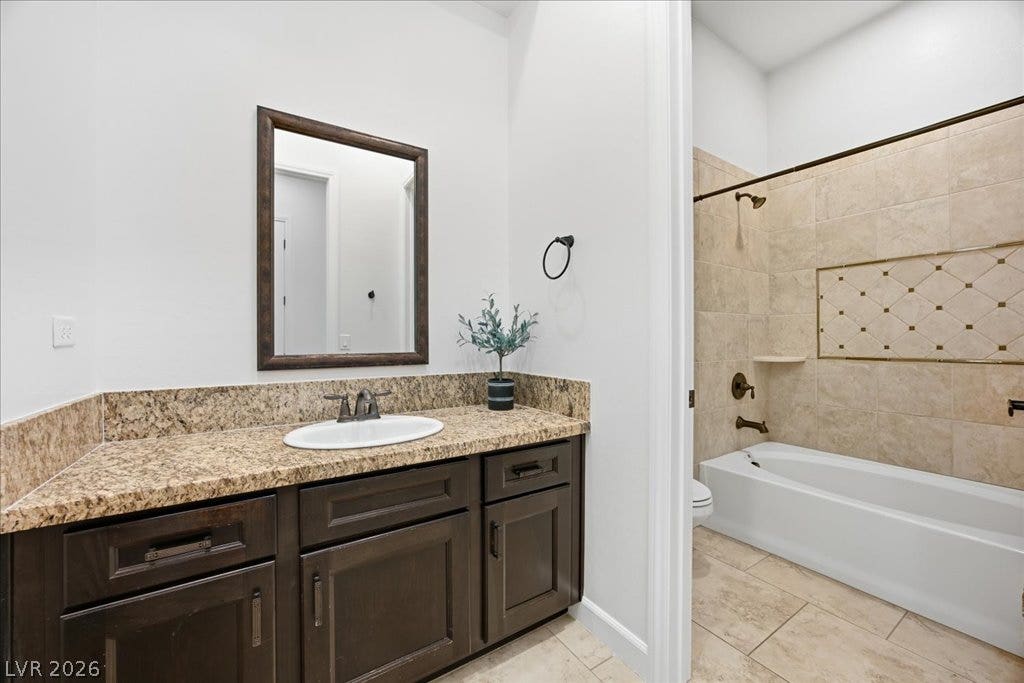 8030 Palm Cove Court, Las Vegas, NV 89129 Bathroom 3: Bedroom 2 and 3 share this bathroom, or can be used as a guest bathroom. Access from the hallway.