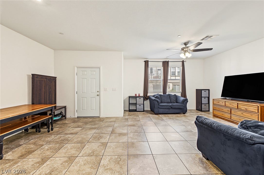 1180 Gypsum Hills Court, Henderson, NV 89002 Durable tile flooring and a wide entryway define this versatile open living space.