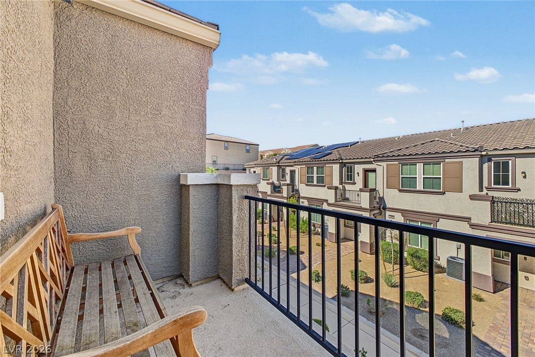 1180 Gypsum Hills Court, Henderson, NV 89002 An elevated private balcony overlooks the neighboring community courtyard.