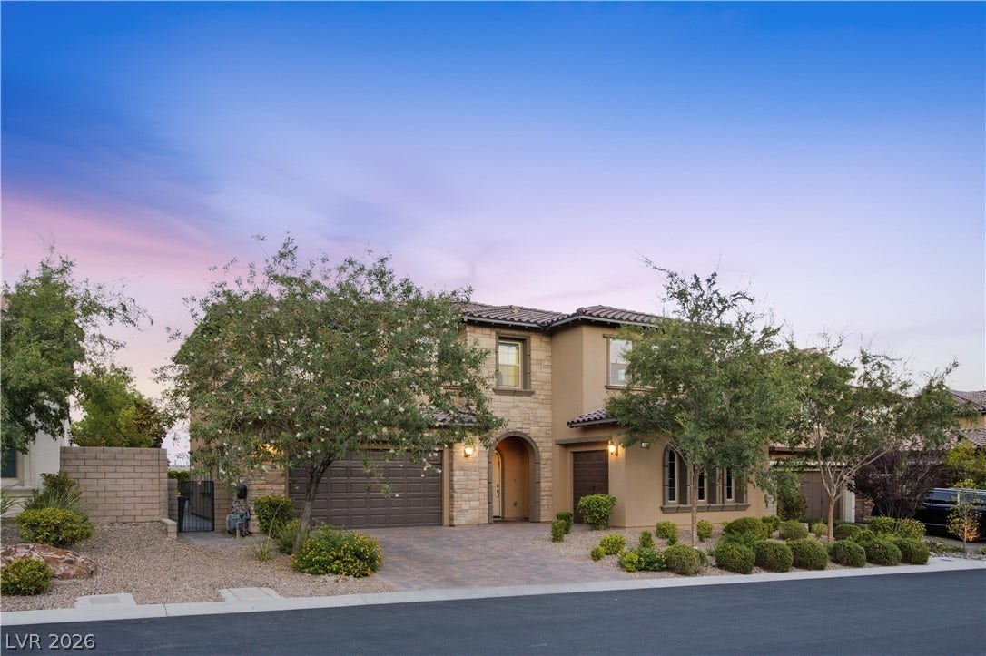 446 Bosco Di Fiore Street, Las Vegas, NV 89138 An elegant stone and stucco exterior anchors this refined multi-level residence.