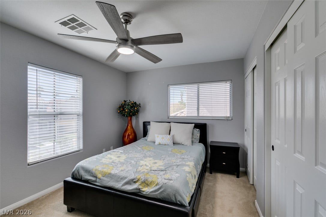 236 Fox Lake Avenue, Las Vegas, NV 89148 Plentiful natural light streams through multiple windows in this cozy secondary bedroom.