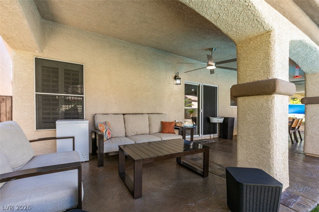 236 Fox Lake Avenue, Las Vegas, NV 89148 Stucco pillars frame a sheltered concrete terrace perfect for relaxed outdoor living.