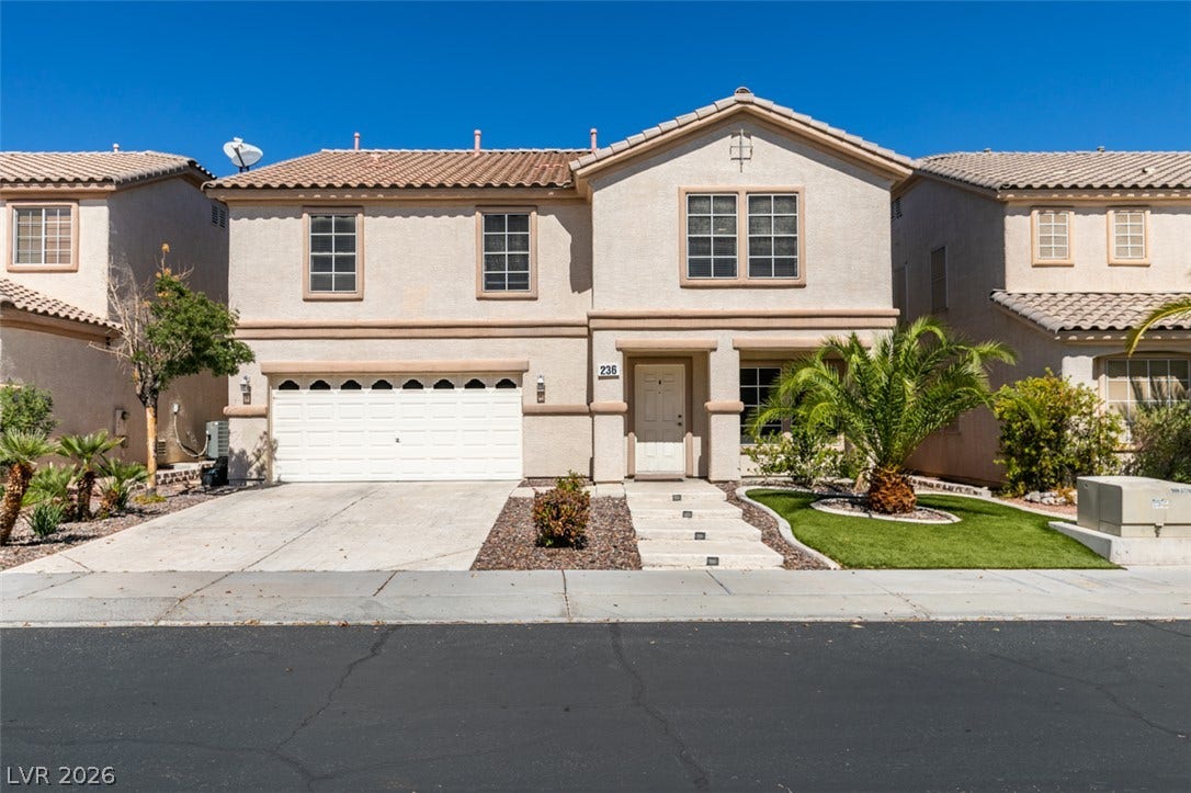 236 Fox Lake Avenue, Las Vegas, NV 89148 Spanish tile roofing and classic stucco exterior define this beautiful two-story residential design.