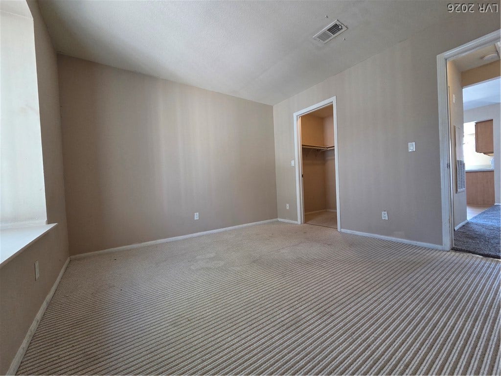 7300 Pirates Cove Road, #2060, Las Vegas, NV 89145 An intriguing textured ceiling tops this versatile bonus room with clean neutral flooring.