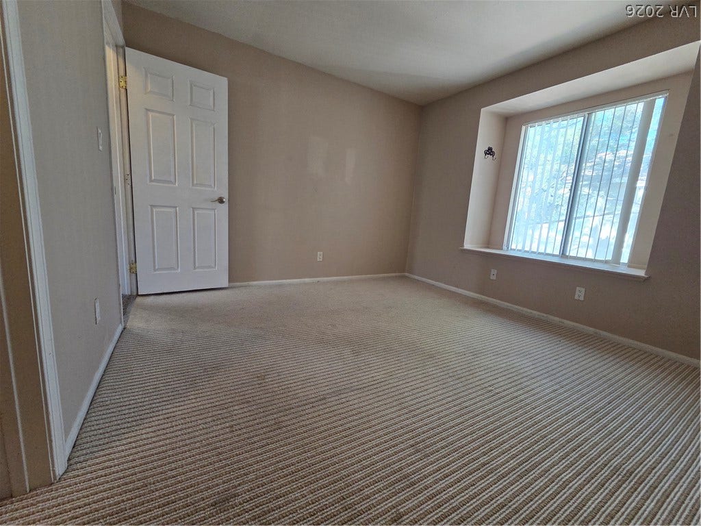7300 Pirates Cove Road, #2060, Las Vegas, NV 89145 Textured ceilings and a deep window seat bring unique character to this versatile bedroom.
