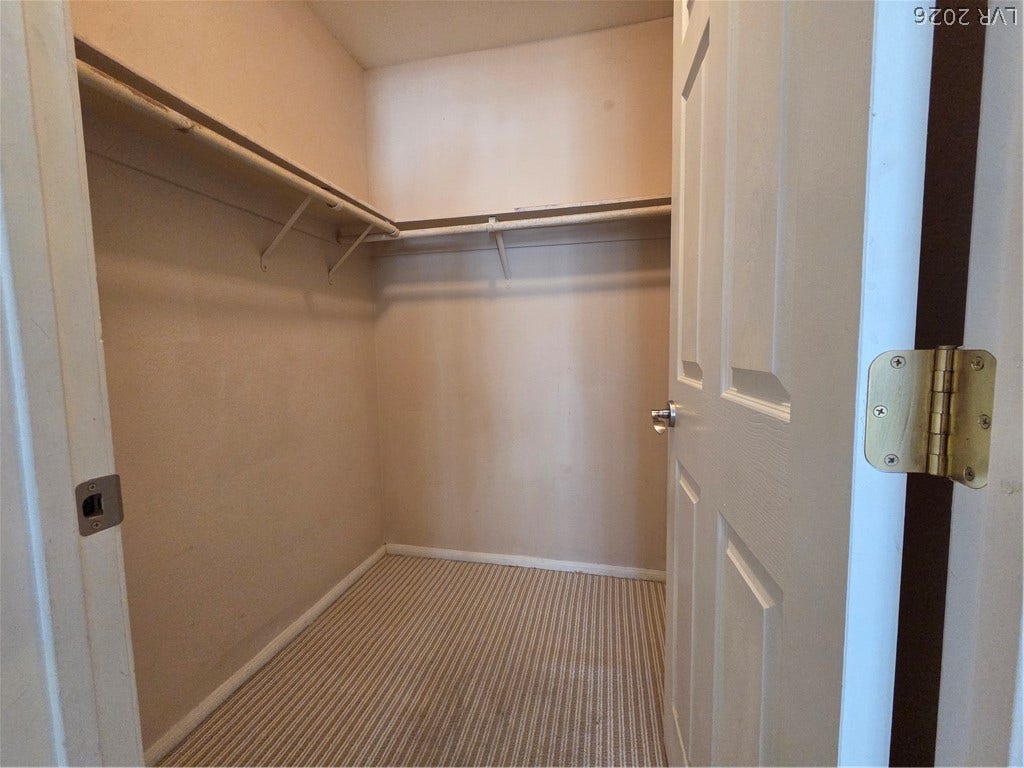 7300 Pirates Cove Road, #2060, Las Vegas, NV 89145 Functional shelving units line this practical storage space.
