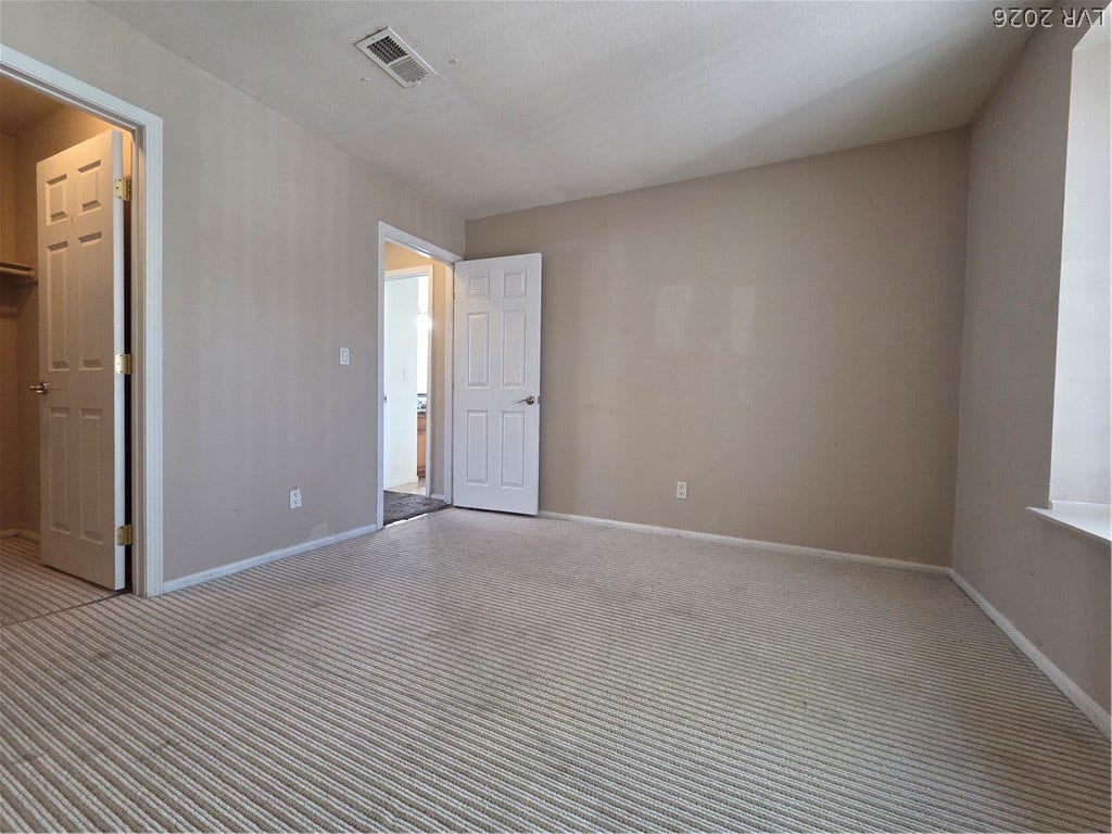 7300 Pirates Cove Road, #2060, Las Vegas, NV 89145 A textured ceiling and carpeted flooring define this versatile bonus space.