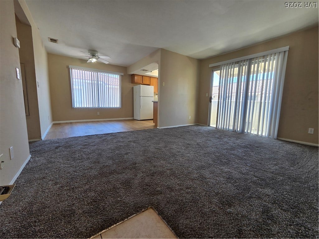 7300 Pirates Cove Road, #2060, Las Vegas, NV 89145 An open living area anchors the main floor with direct views toward the kitchen.