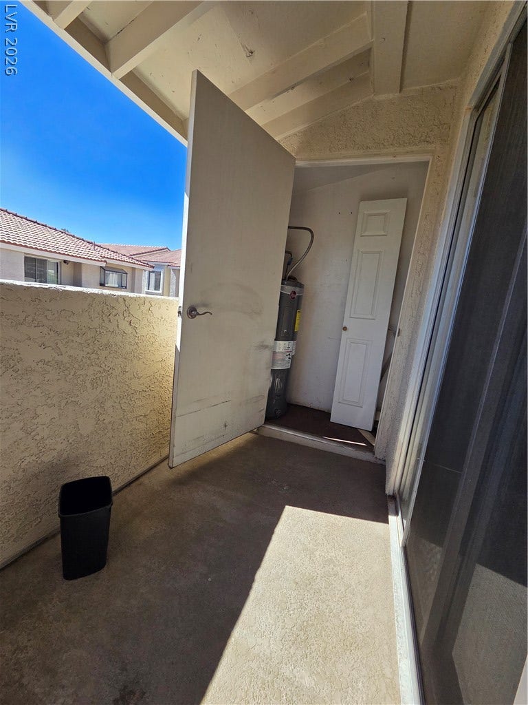 7300 Pirates Cove Road, #2060, Las Vegas, NV 89145 A functional outdoor utility space stands ready adjacent to the covered patio area.