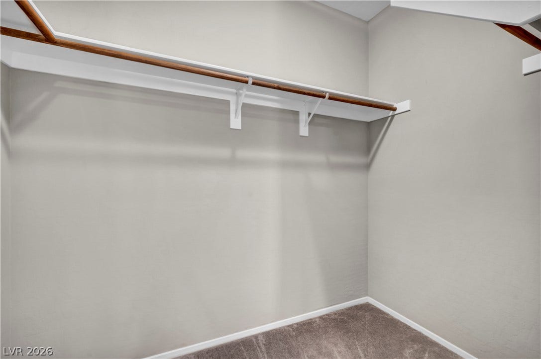 8577 Insignia Avenue, #101, Las Vegas, NV 89178 Generous closet space includes integrated shelving, built-in hanging rods, and plush carpeting.