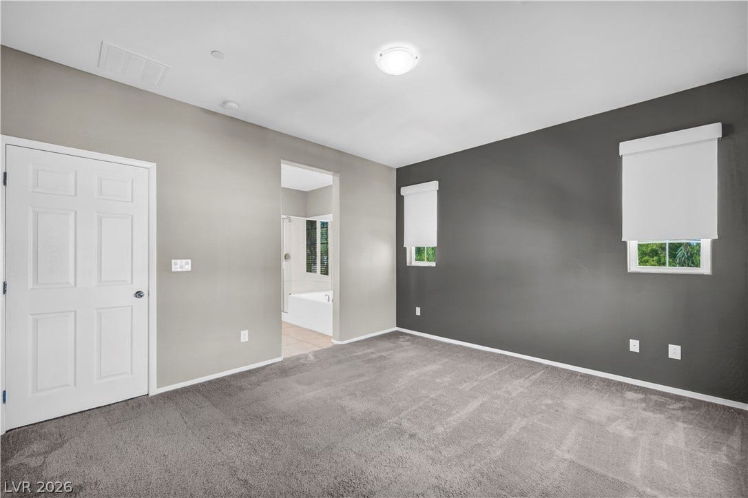 8577 Insignia Avenue, #101, Las Vegas, NV 89178 Plush carpeting and an attached bathroom define this quiet, comfortable retreat.