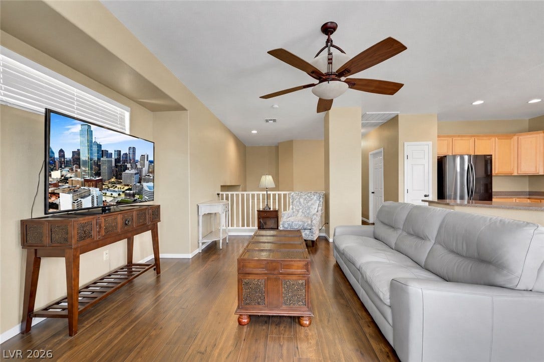 Great room looking to backyard and kitchen/ dining space. (AI used to remove contents of room).