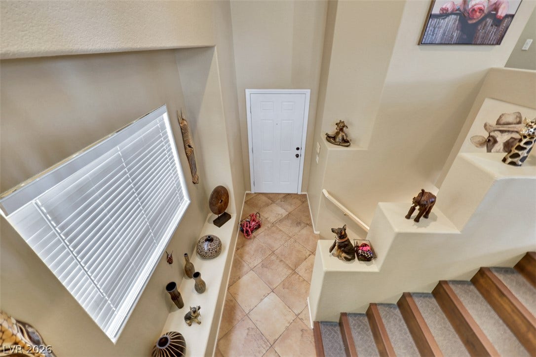 Staircase well appointed at front of home allowing great use of floor plan and space!
