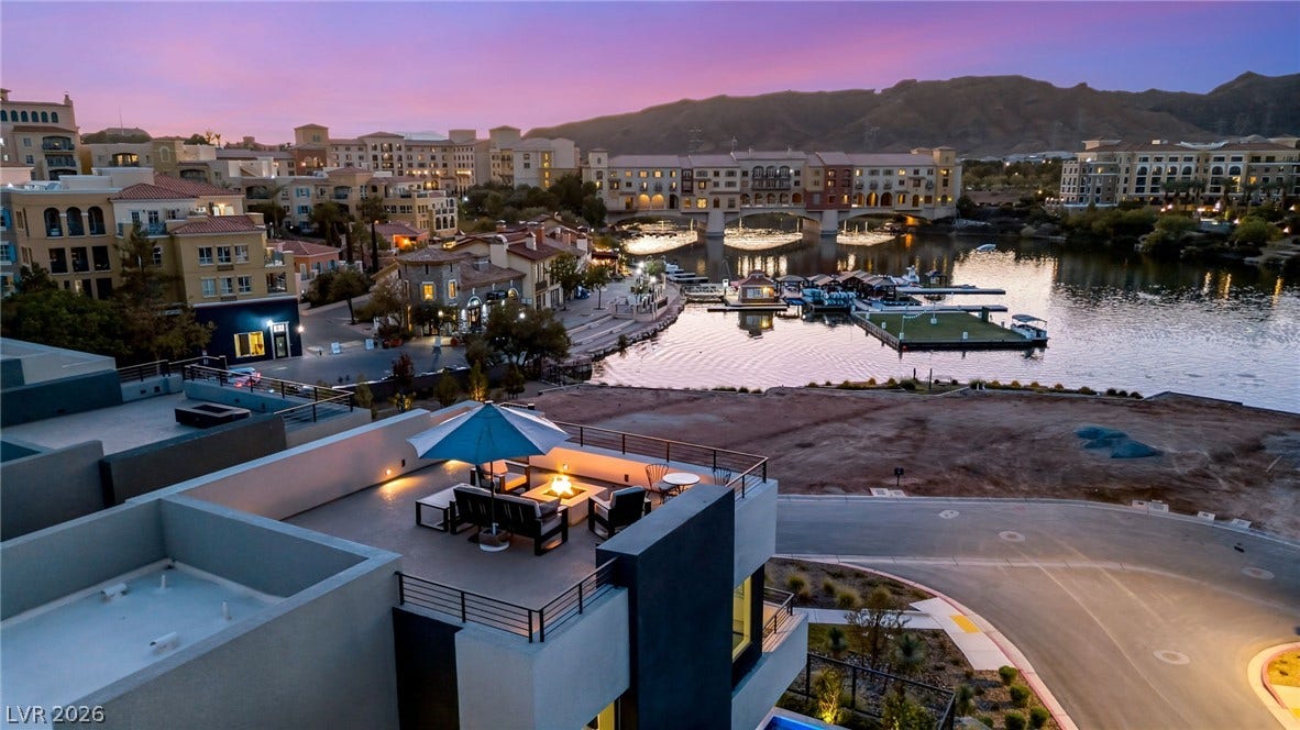 18 Heron Harbour Drive, Henderson, NV 89011 Panoramic mountain and water vistas unfold from this spacious rooftop terrace.