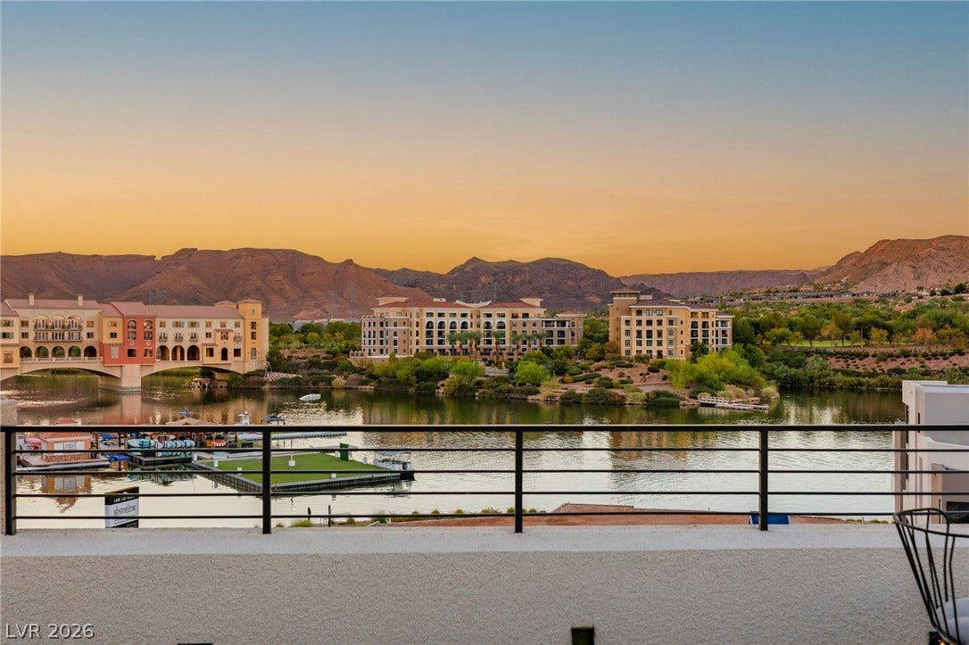 18 Heron Harbour Drive, Henderson, NV 89011 Picturesque water and mountain views frame this elevated terrace overlook.