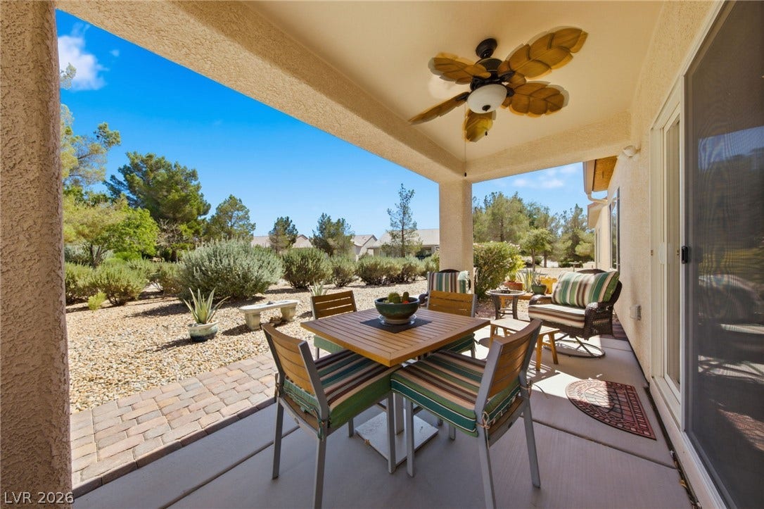 7340 Shelduck Street, North Las Vegas, NV 89084 A sheltered back porch looks out over low-maintenance landscaping and desert greenery.