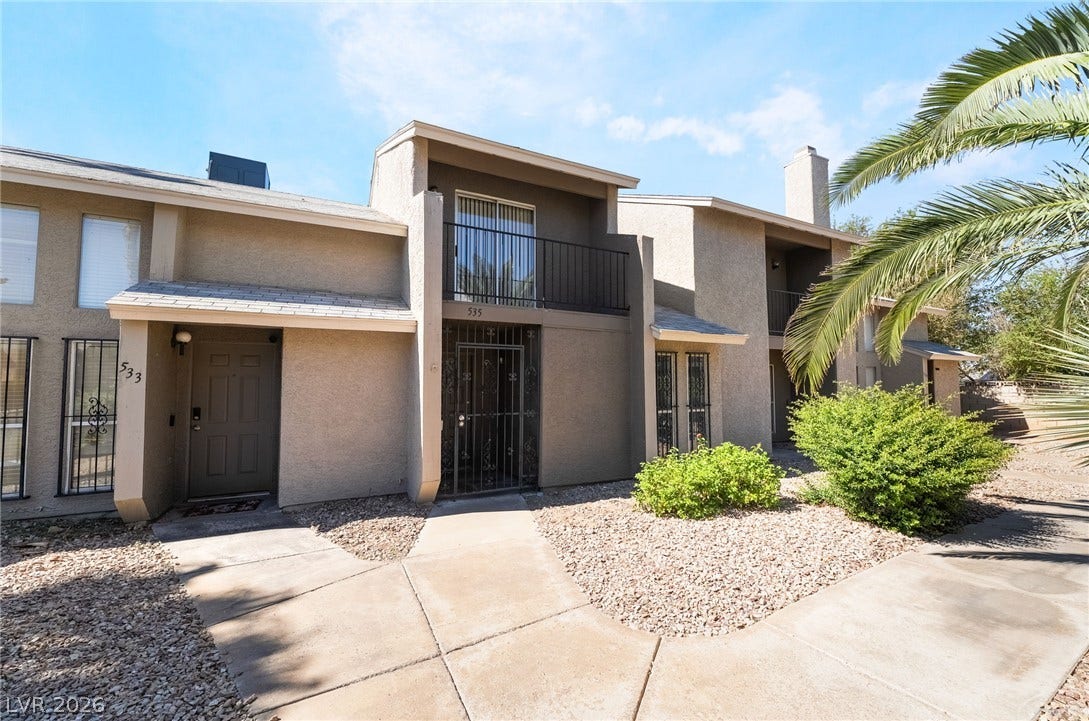 535 Sellers Place, Henderson, NV 89011 Concrete walkways lead to the inviting front entrances of these multi-level stucco residences.