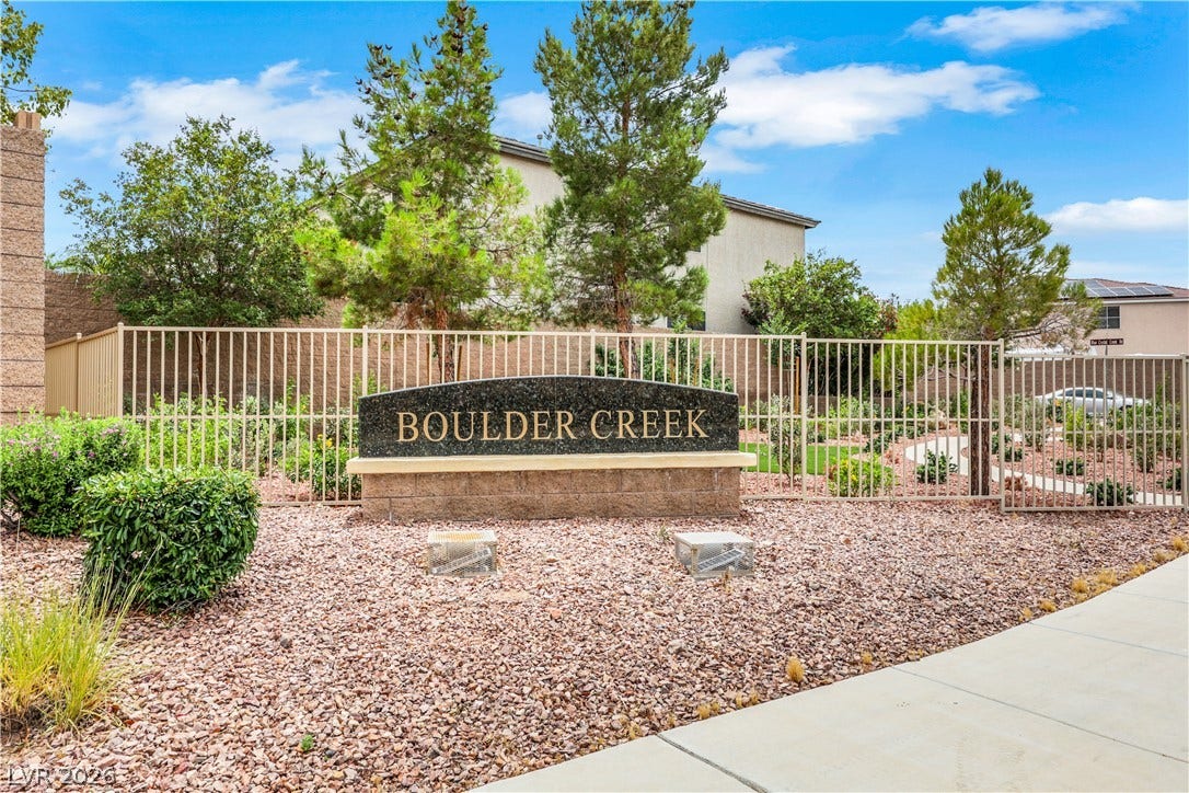 625 Bighorn Creek Street, Henderson, NV 89002 An inviting entrance with well-maintained landscaping marks this peaceful community.