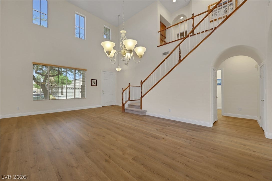 625 Bighorn Creek Street, Henderson, NV 89002 Gleaming wood floors and a soaring ceiling define this welcoming entry space.