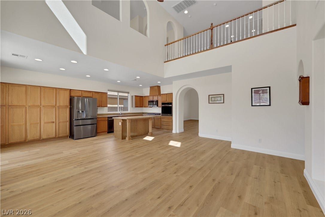 625 Bighorn Creek Street, Henderson, NV 89002 An airy open concept layout connects the kitchen to the dramatic double-height great room.