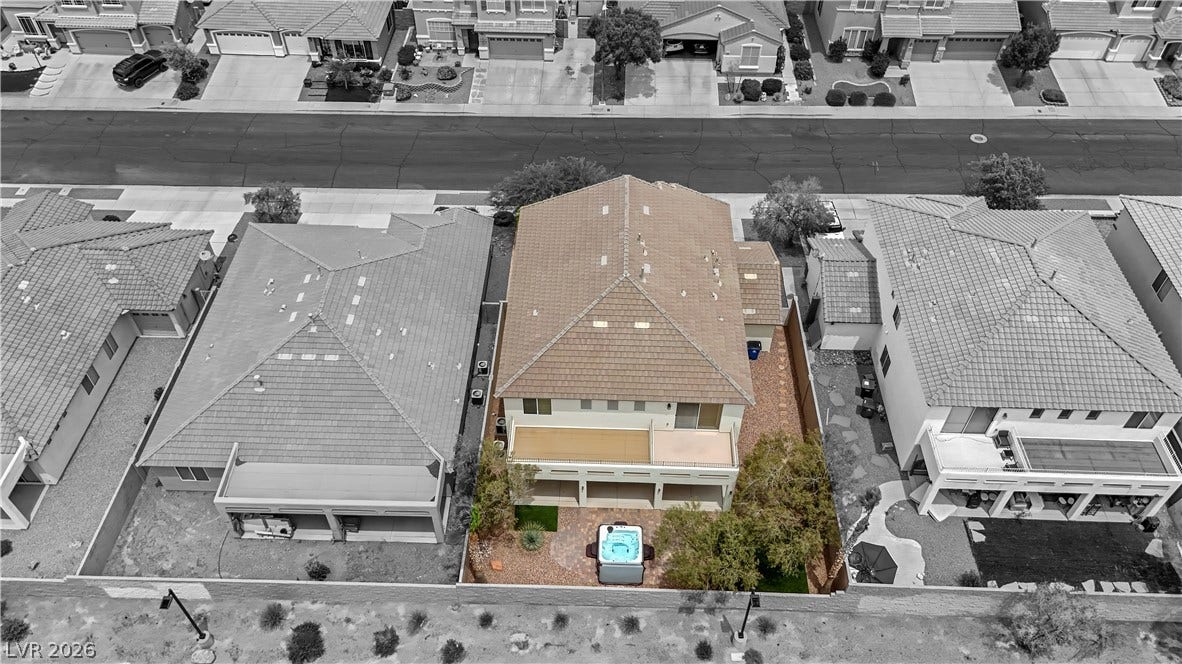 625 Bighorn Creek Street, Henderson, NV 89002 An aerial perspective reveals a private yard with a spa, offering serene outdoor living.