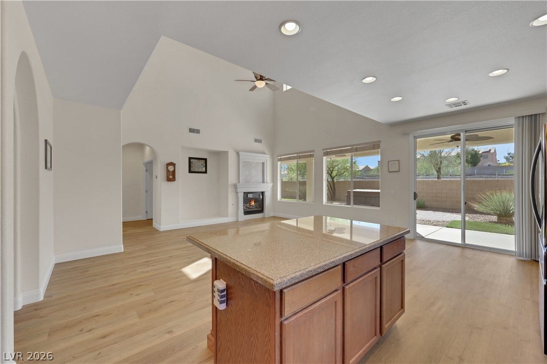 625 Bighorn Creek Street, Henderson, NV 89002 Sliding glass doors and high ceilings elevate this open interior layout.
