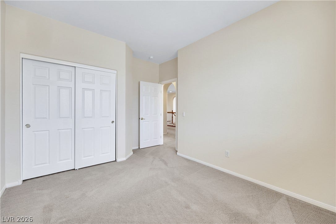 625 Bighorn Creek Street, Henderson, NV 89002 Ample closet space complements this versatile room, offering functional living.
