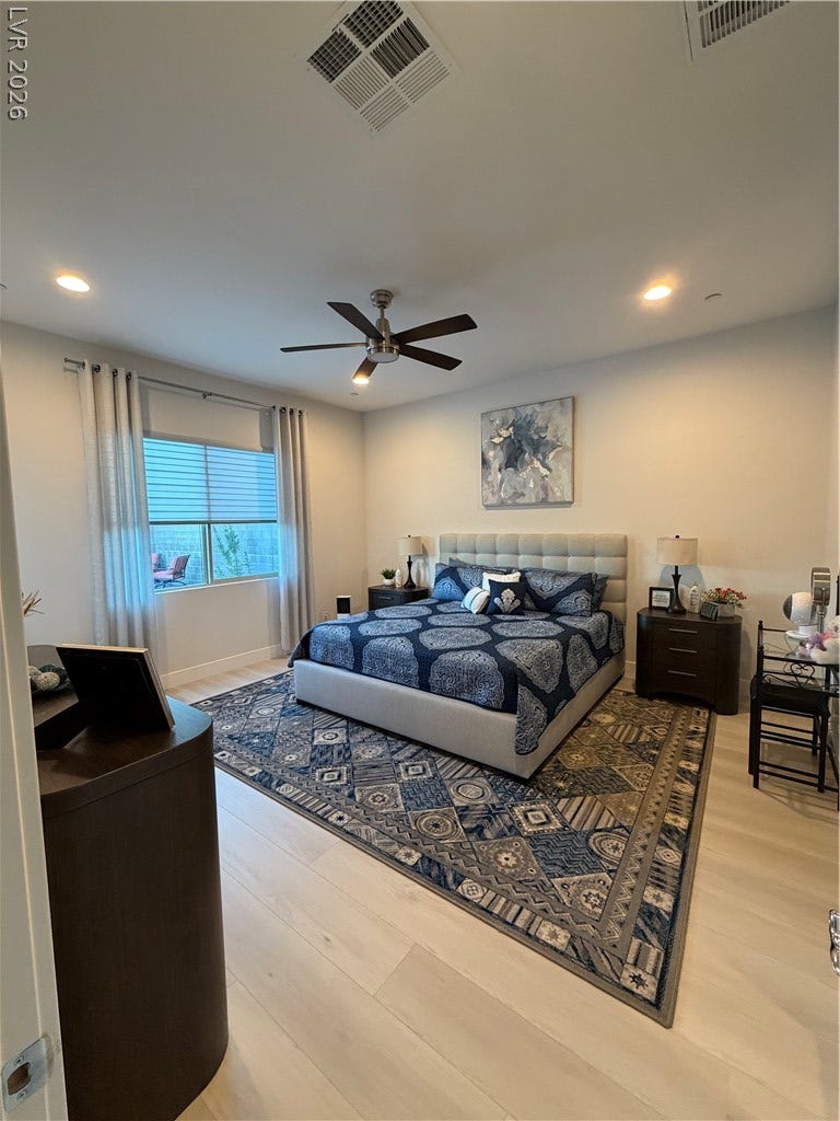 11725 Hatchling Avenue, Las Vegas, NV 89138 Luxury vinyl flooring and recessed lighting enhance this Master bedroom.