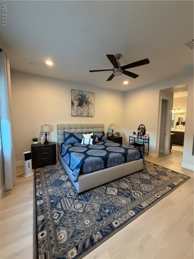 11725 Hatchling Avenue, Las Vegas, NV 89138 Gleaming light and high ceilings define this comfortable Master bedroom retreat.