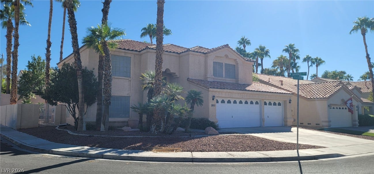 2001 Silverton Drive, Henderson, NV 89074 Stately stucco architectural details and a classic tile roof define this multi-level desert residence.