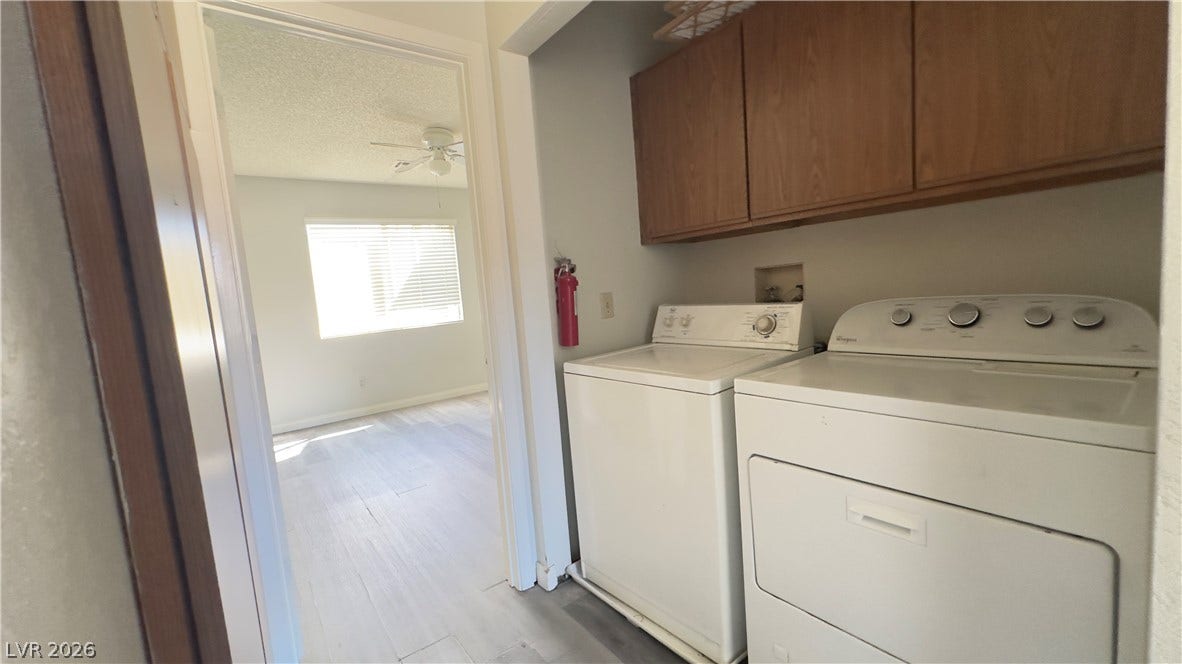 543 KRISTIN Lane, Henderson, NV 89011 A dedicated laundry alcove includes overhead cabinetry and connects seamlessly to adjacent living areas.