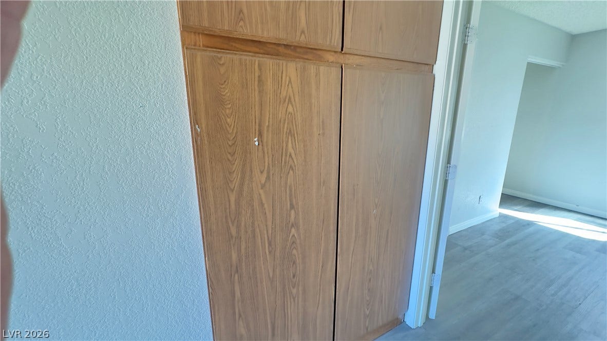 543 KRISTIN Lane, Henderson, NV 89011 Built-in hallway cabinetry provides valuable storage adjacent to the bright living areas.