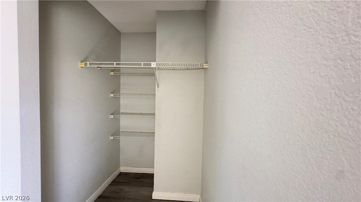 543 KRISTIN Lane, Henderson, NV 89011 Functional wire shelving maximizes organization within this versatile storage space.