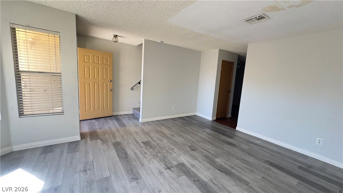 543 KRISTIN Lane, Henderson, NV 89011 Clean lines and durable wood-look flooring define this versatile open living space.