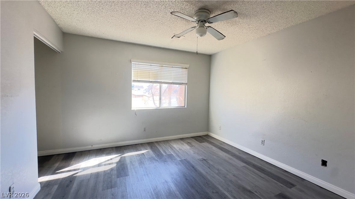 543 KRISTIN Lane, Henderson, NV 89011 Smooth modern flooring pairs with natural light streaming through a central window.