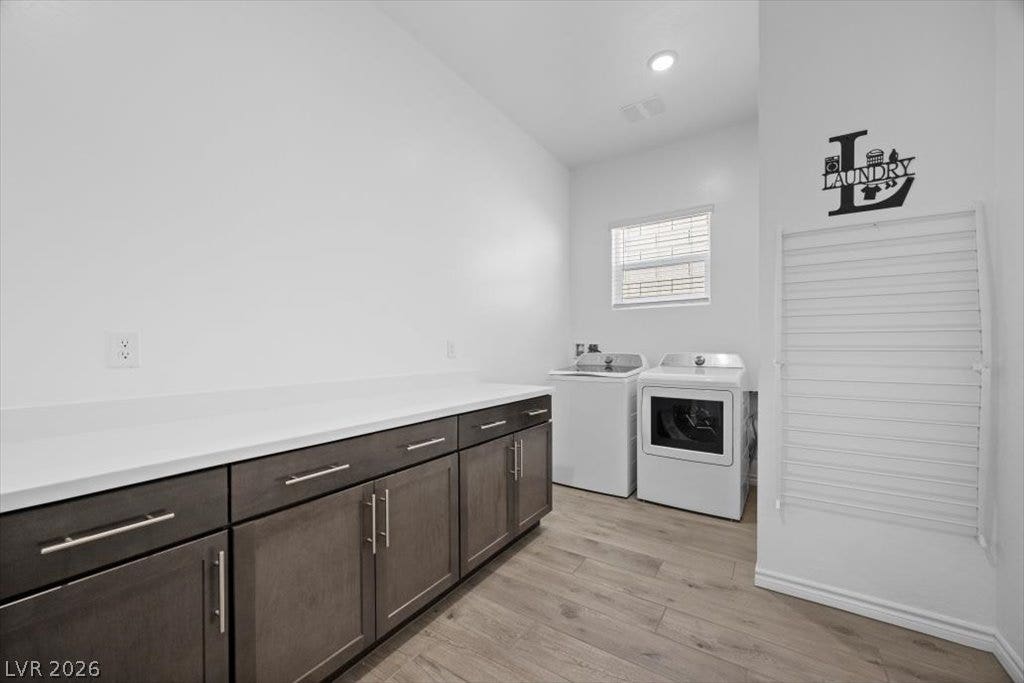 Ample counter space and built-in cabinetry streamline workflow in this functional utility area.