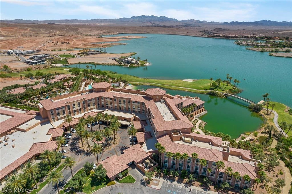 Sweeping water and desert mountain vistas from above