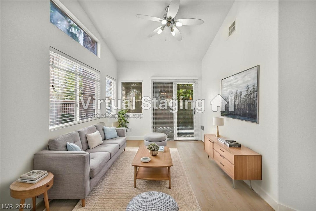 1745 Lily Pond Circle, Henderson, NV 89012 High vaulted ceilings and rich wood floors create an airy, open living environment.