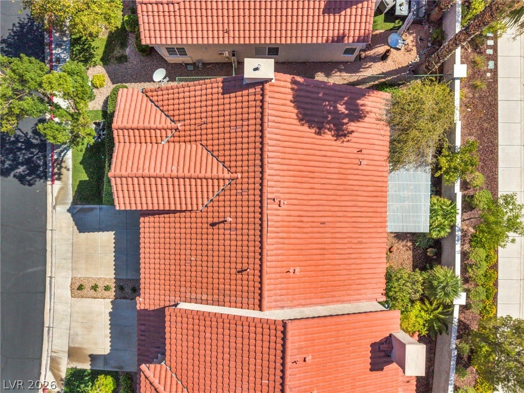1745 Lily Pond Circle, Henderson, NV 89012 A classic tile roof covers this home nestled in a quiet residential neighborhood.