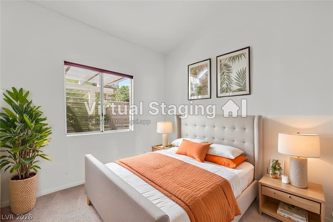 1745 Lily Pond Circle, Henderson, NV 89012 Natural light fills this peaceful bedroom featuring clean lines and soft carpeting.