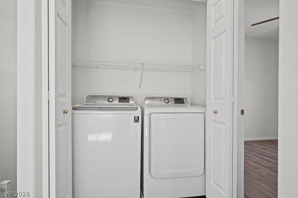 754 Solitude Point Avenue, Henderson, NV 89012 An organized laundry closet features folding doors and overhead wire shelving.
