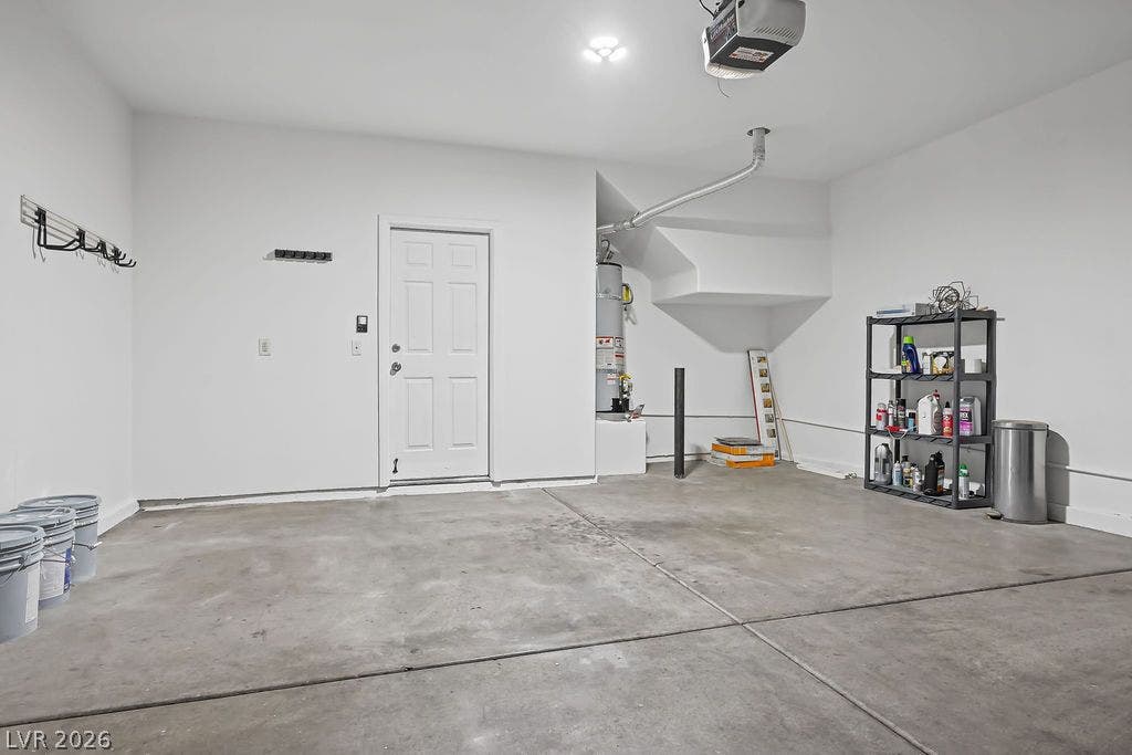 754 Solitude Point Avenue, Henderson, NV 89012 An attached garage provides durable concrete flooring and direct interior home access.