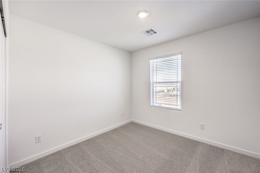 7339 TANYA FALLS Street, North Las Vegas, NV 89084 Photo is of a 1550 Plan Production Home Within the Community- NOT THE ACTUAL HOME FOR SALE *material/features/colors can vary & are subject to change*