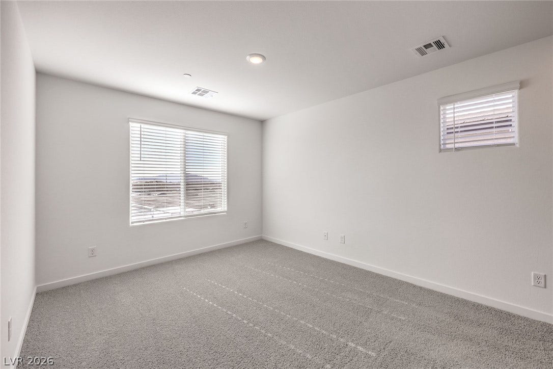 7339 TANYA FALLS Street, North Las Vegas, NV 89084 Photo is of a 1550 Plan Production Home Within the Community- NOT THE ACTUAL HOME FOR SALE *material/features/colors can vary & are subject to change*