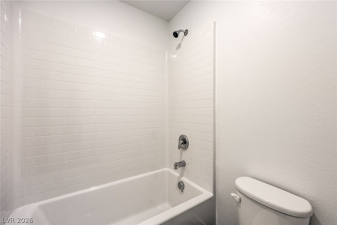 7339 TANYA FALLS Street, North Las Vegas, NV 89084 Photo is of a 1550 Plan Production Home Within the Community- NOT THE ACTUAL HOME FOR SALE *material/features/colors can vary & are subject to change*