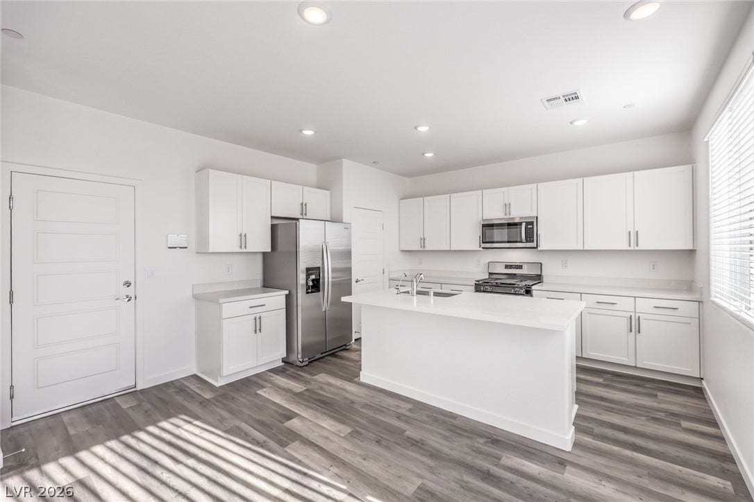 7339 TANYA FALLS Street, North Las Vegas, NV 89084 Photo is of a 1550 Plan Production Home Within the Community- NOT THE ACTUAL HOME FOR SALE *material/features/colors can vary & are subject to change*