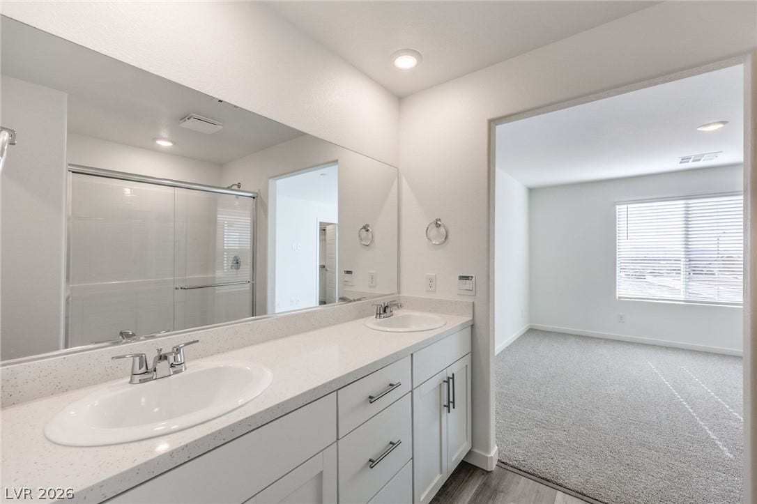 7339 TANYA FALLS Street, North Las Vegas, NV 89084 Photo is of a 1550 Plan Production Home Within the Community- NOT THE ACTUAL HOME FOR SALE *material/features/colors can vary & are subject to change*
