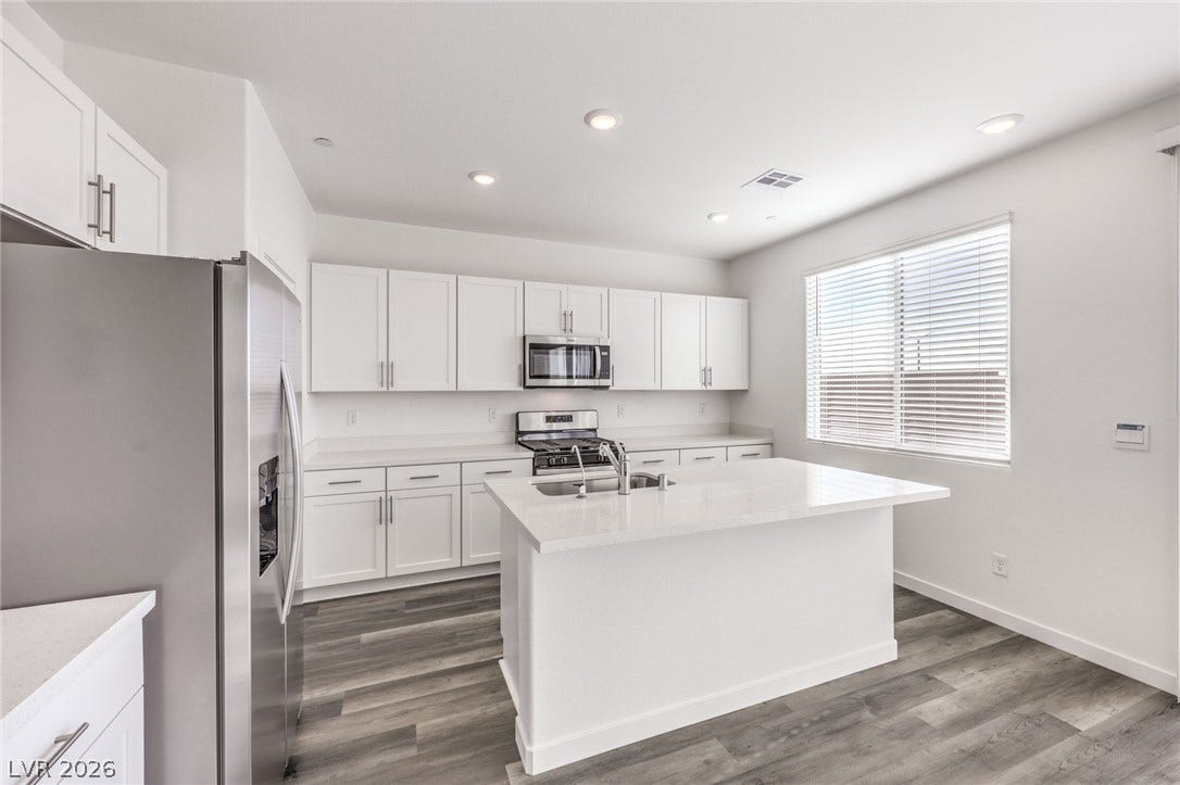 7339 TANYA FALLS Street, North Las Vegas, NV 89084 Photo is of a 1550 Plan Production Home Within the Community- NOT THE ACTUAL HOME FOR SALE *material/features/colors can vary & are subject to change*